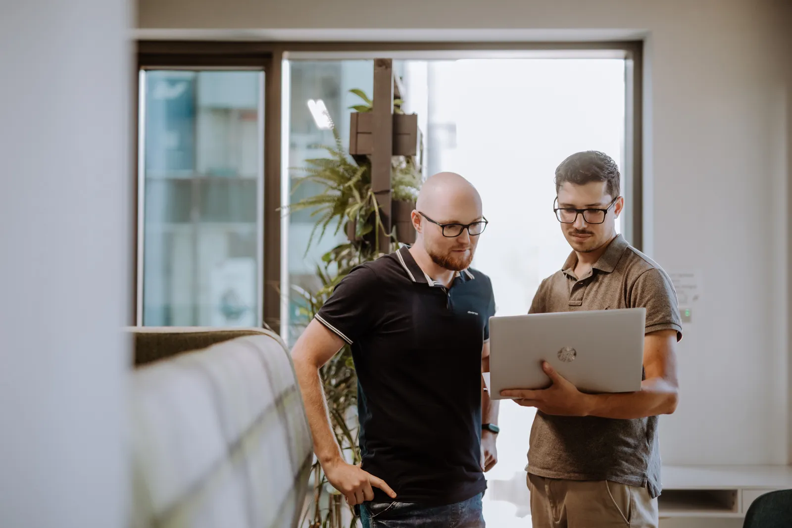 Two Xelerit engineers collaborating